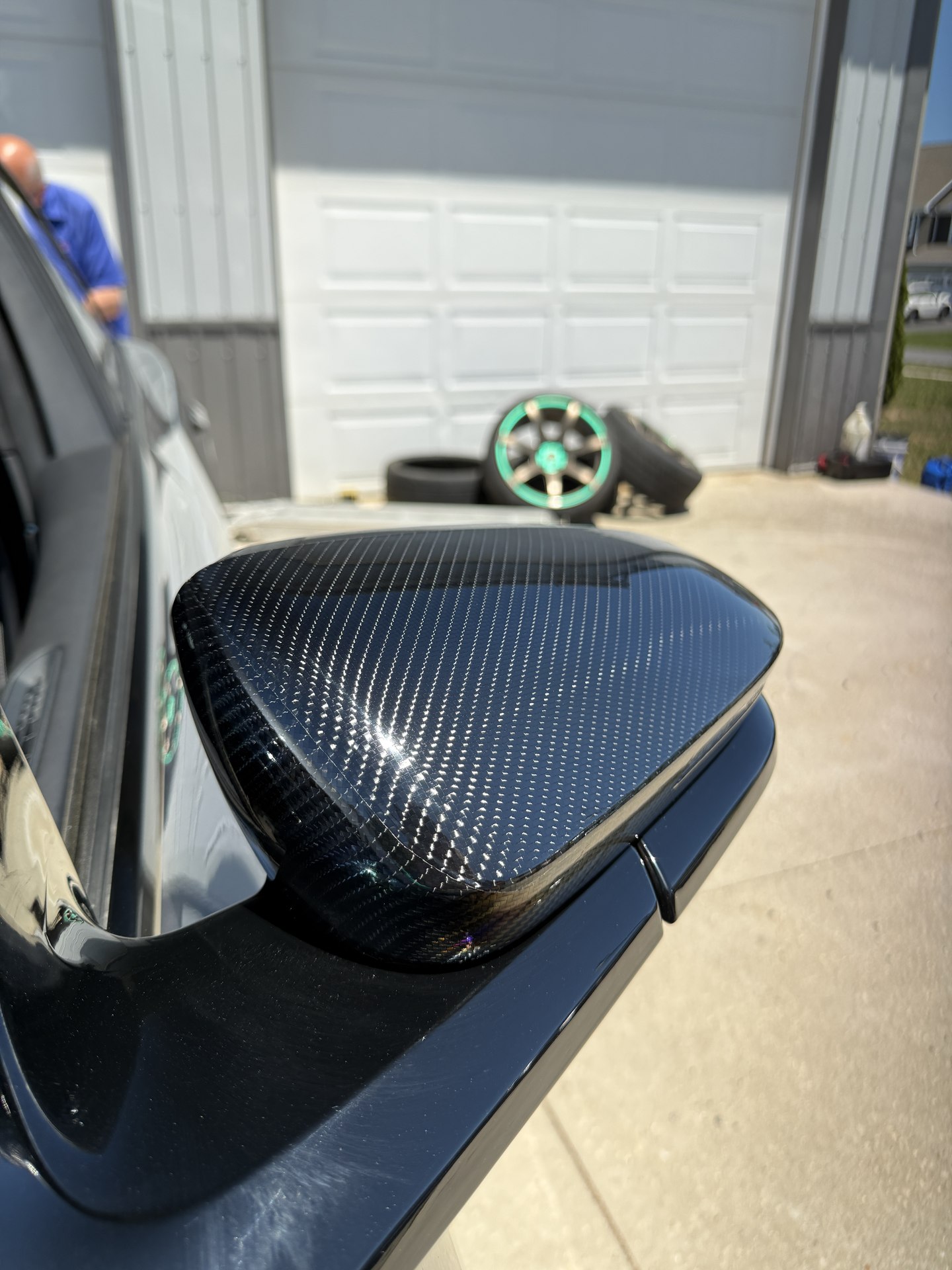 Carbon Fiber Details — side mirror vinyl finish by Coastal Wraps